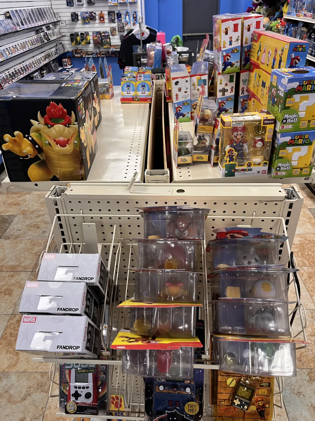 Store aisle with Super Mario figures and collectibles