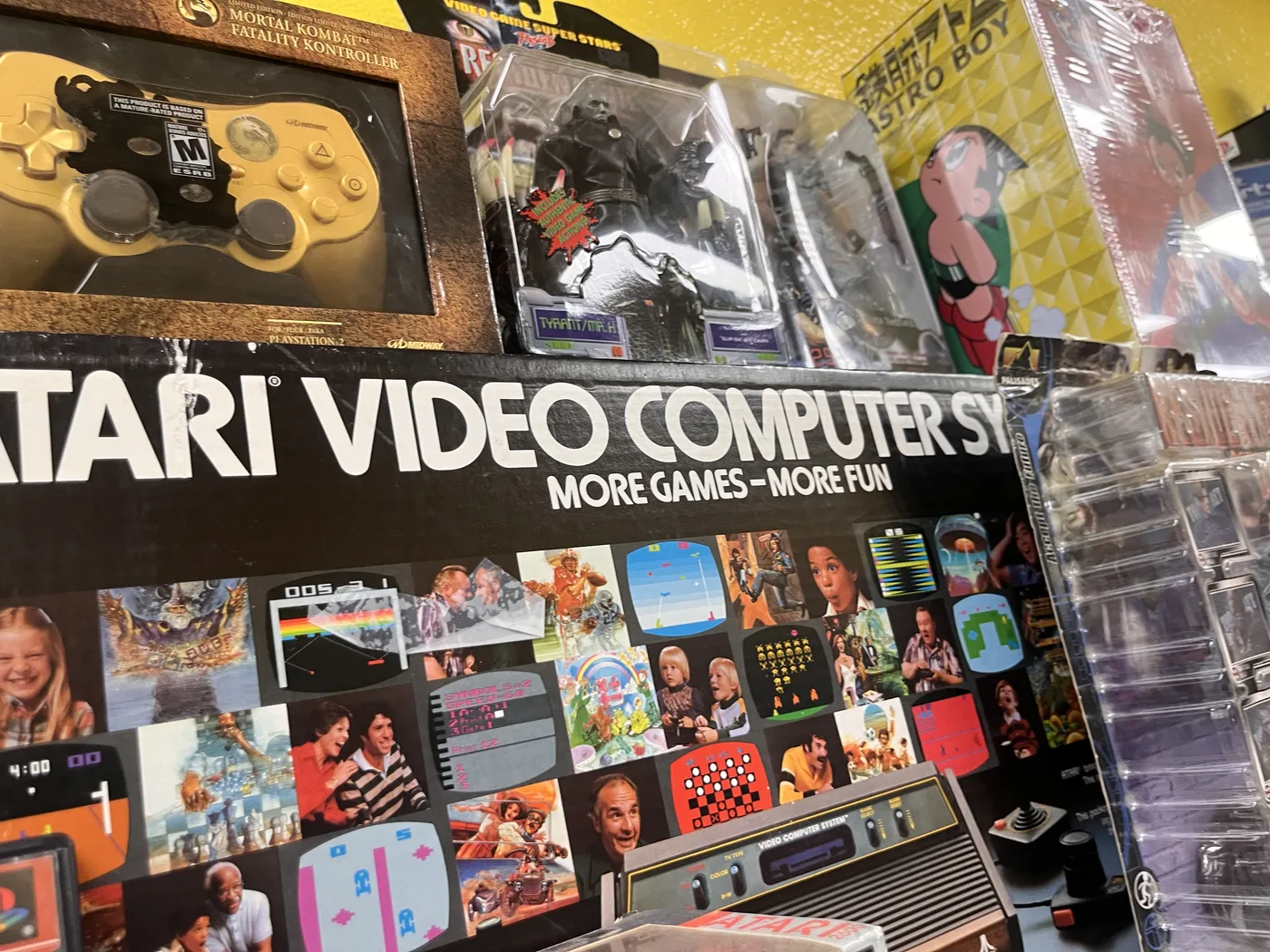 Atari console box and rare retro collectibles